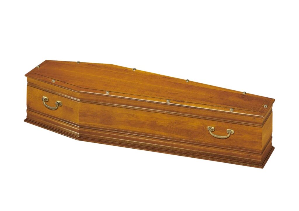 Cercueil en bois avec poignées métalliques dorées